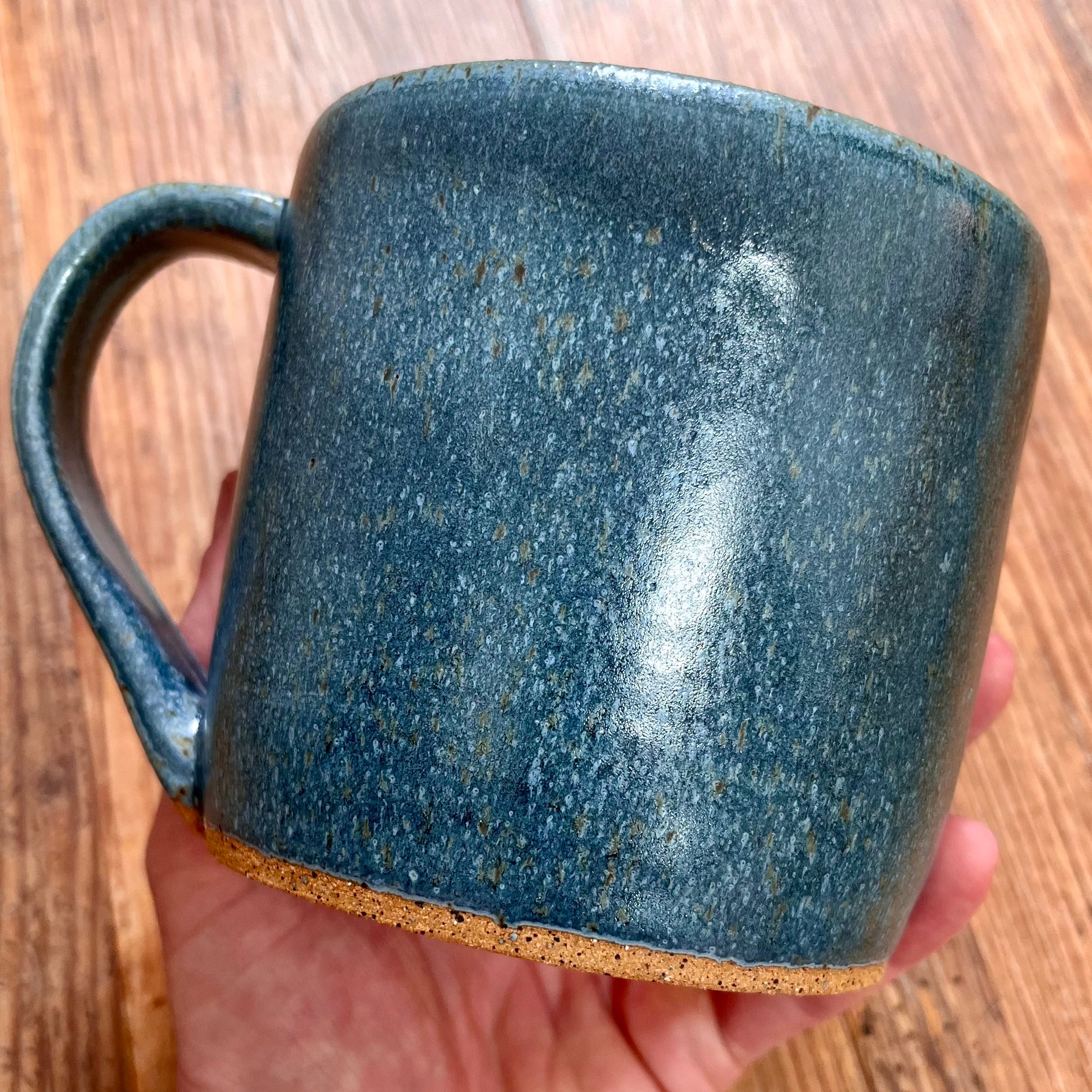 A greenish blue mug